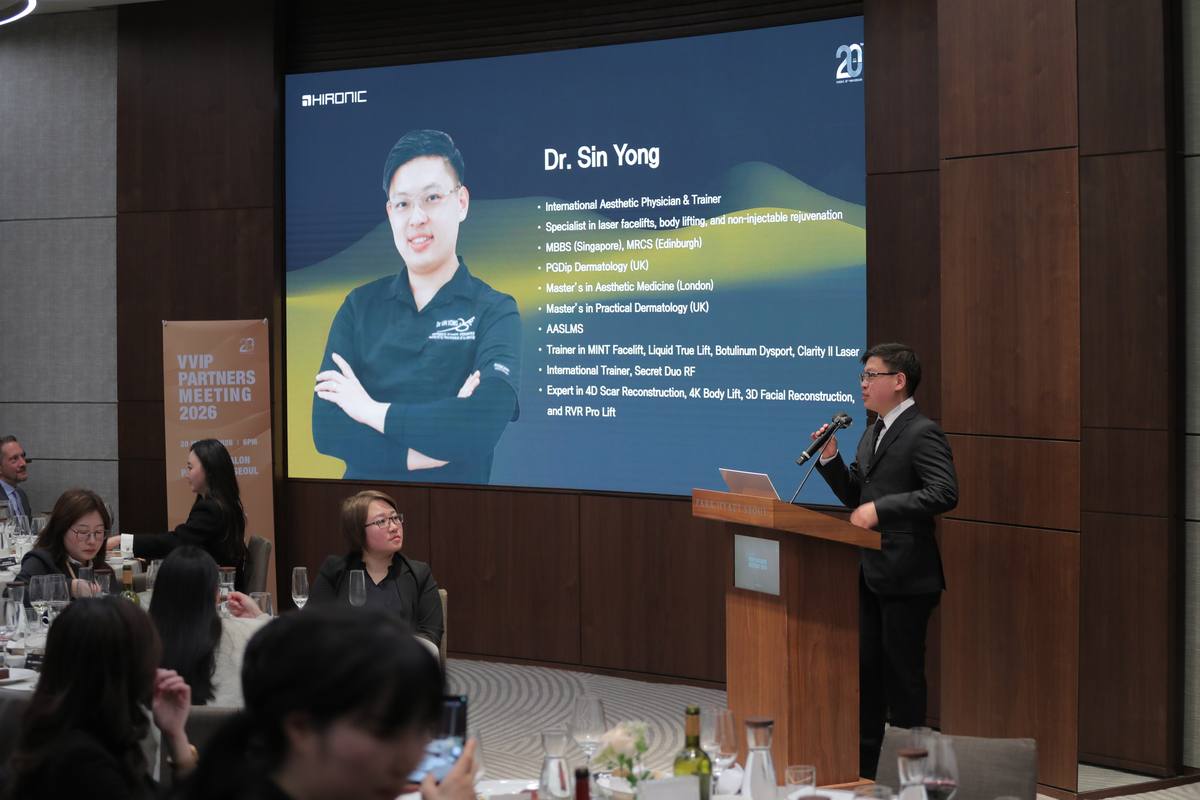 Dr Sin Yong presenting at HIRONIC VVIP Partners Meeting 2026 Park Hyatt Seoul — credentials projected on main screen